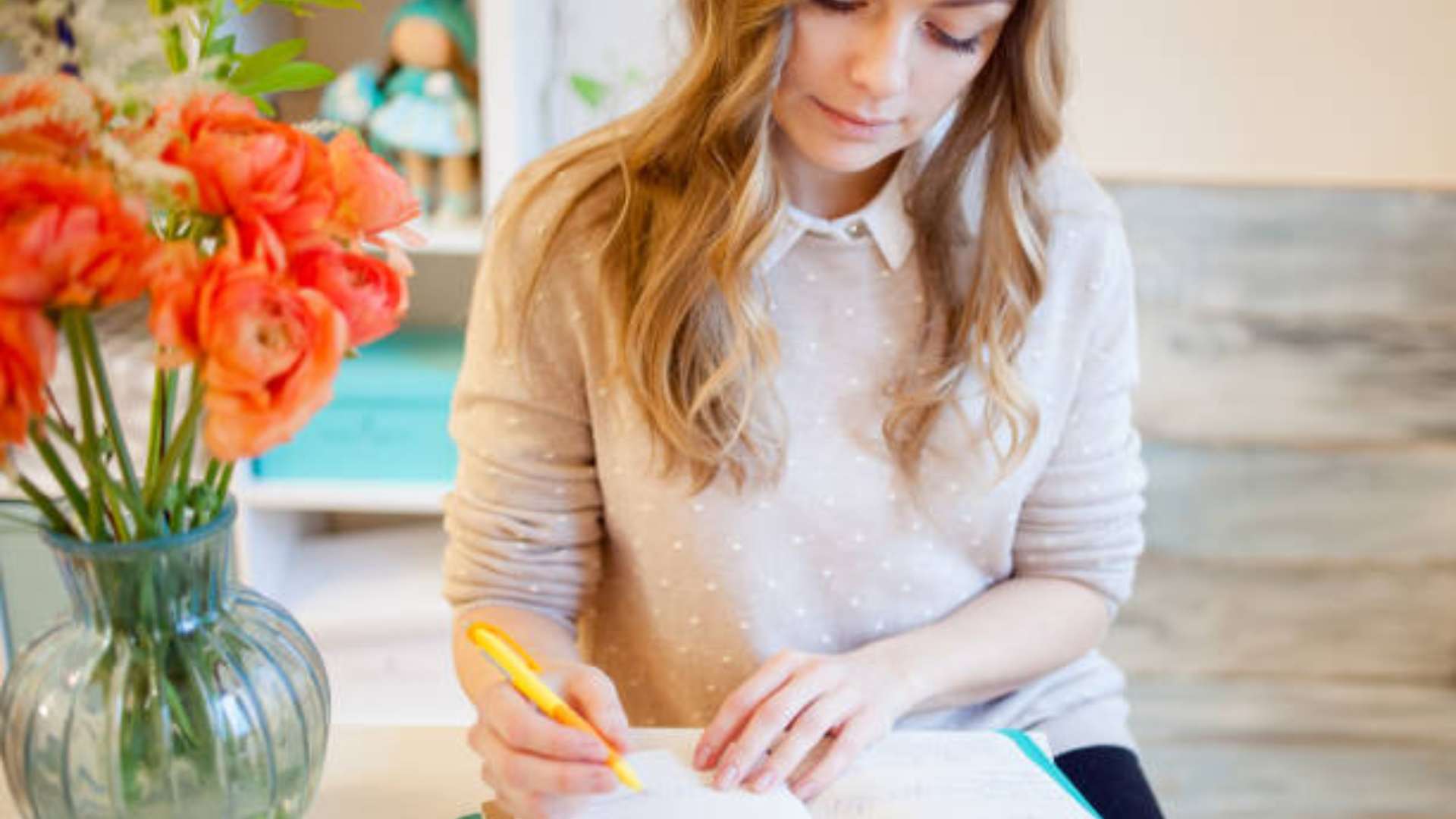 A serene journaling space with an open notebook, lit candle, and peaceful ambiance for Higher Self journaling