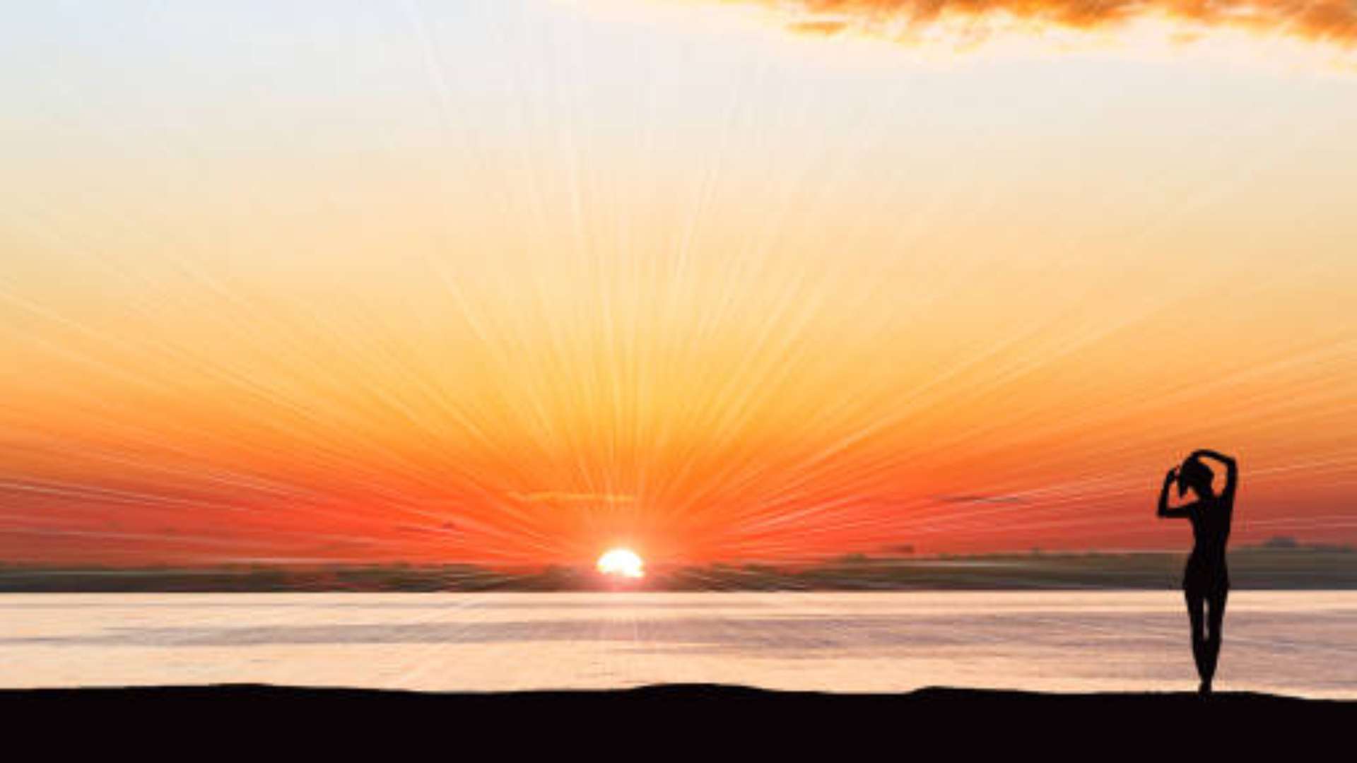 Serene sunrise at a lake symbolizing personal reset and transformation