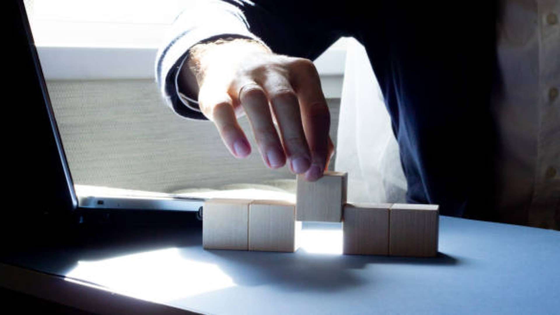 Illustration depicting shadow work and manifestation with a figure in darkness and another meditating in light