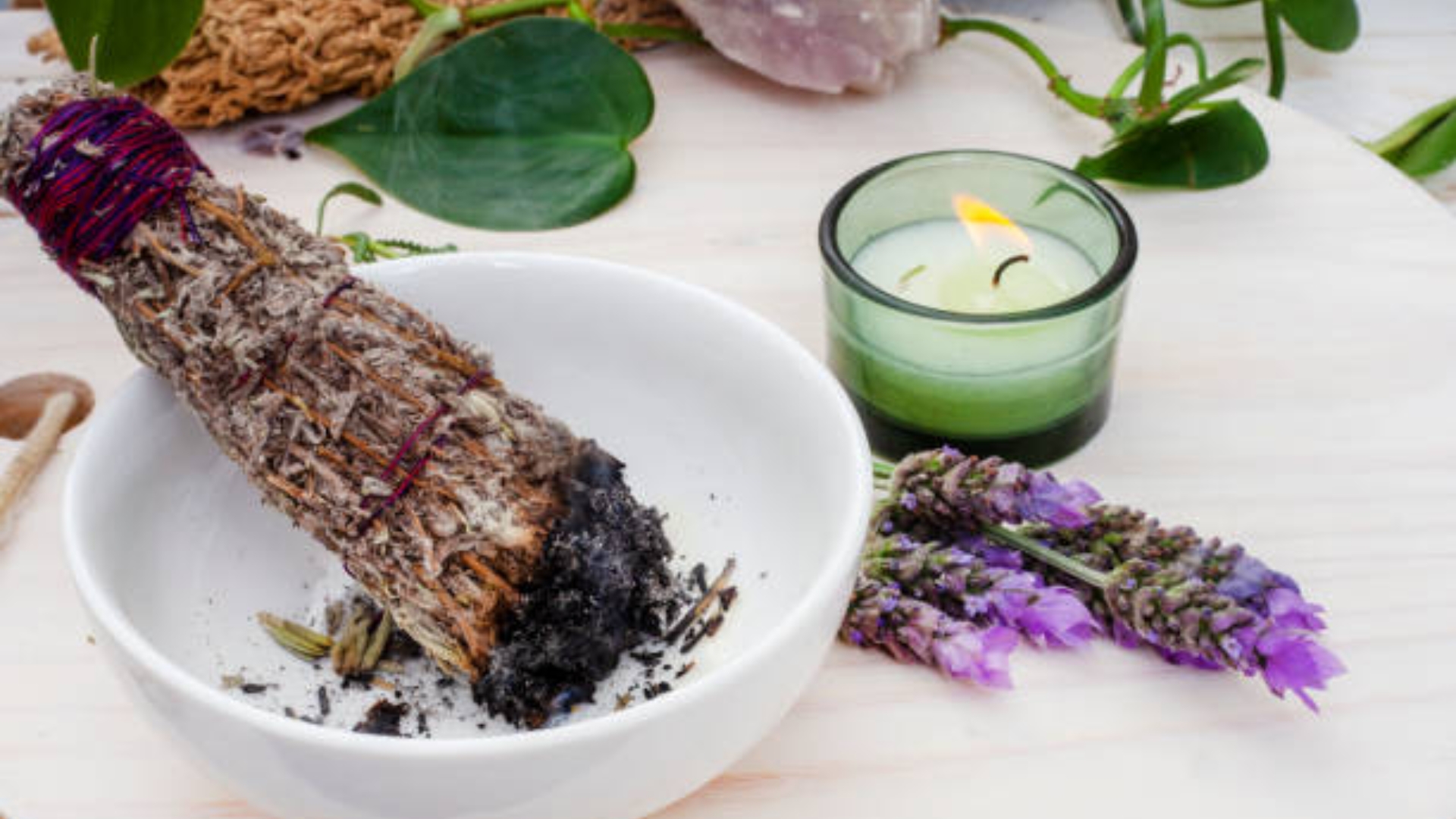 Sacred space with sunlight, crystals, sage, and peaceful energy for home cleansing