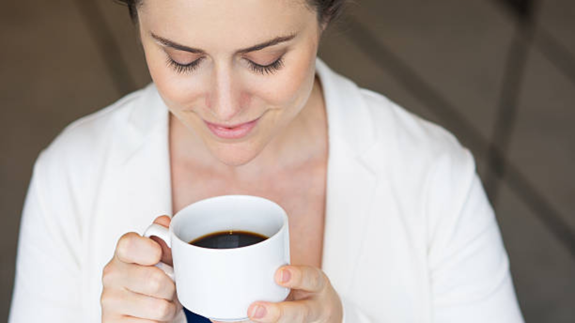 Woman practicing morning breathwork at sunrise