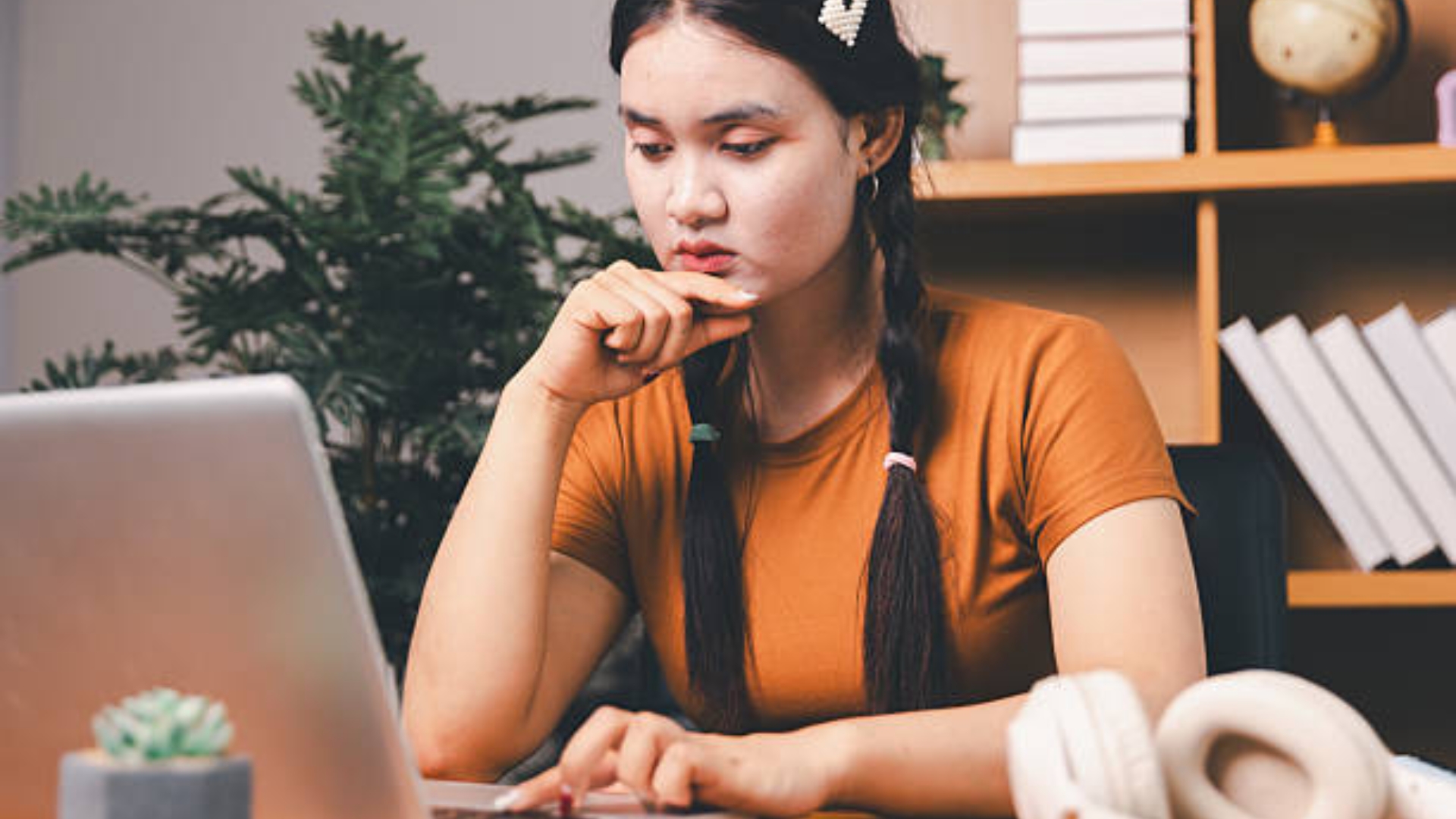 Hands offering a glowing heart, symbolizing service and compassion